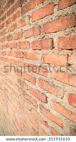 Side view of old orange vintage brick wall background