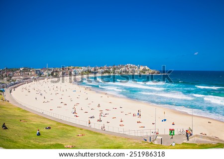People relaxing on the Bondi beach in Sydney, Australia. Bondi beach is one of the most famous beach in the world.  Royalty-Free Stock Photo #251986318
