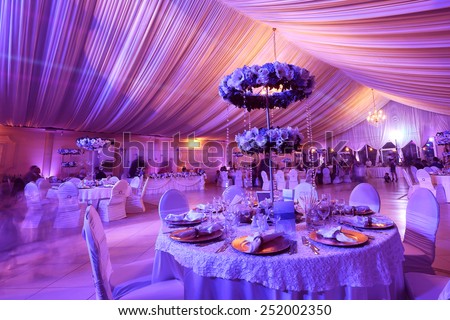 Wedding flowers decoration in the restaurant  Royalty-Free Stock Photo #252002350