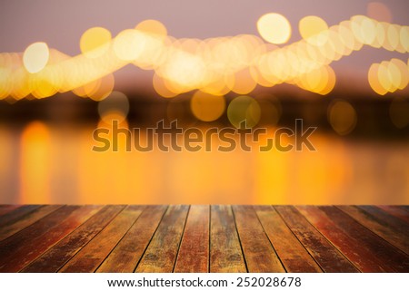 Vintage brown wooden planks with light bokeh background