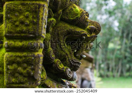 Green lichen Statue