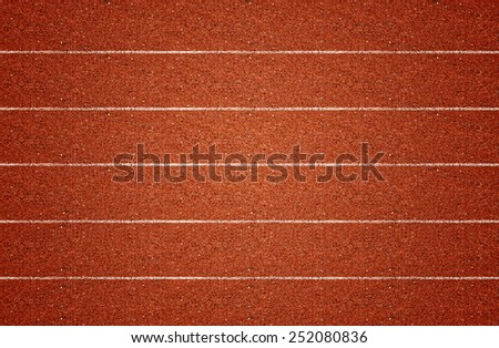 Running track in top view. Royalty-Free Stock Photo #252080836
