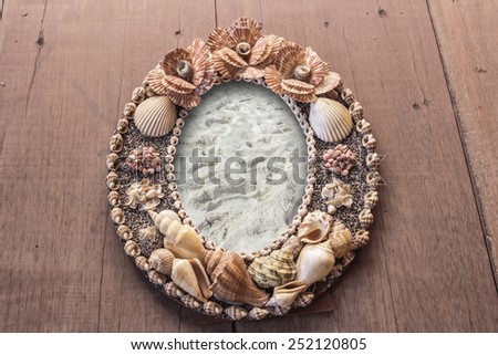 Frame picture made from shells. Picture frame sand.