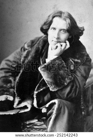 Oscar Wilde (1864-1900), photograph by Napoleon Sarony, 1882 Royalty-Free Stock Photo #252142243