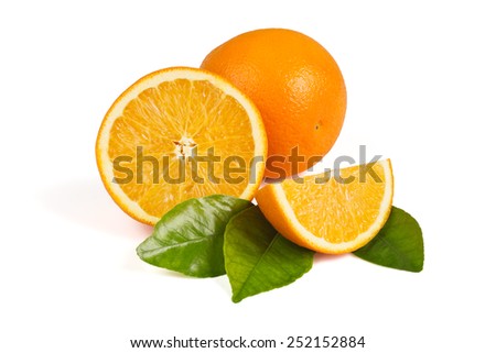 Whole orange, half an orange, orange slice in the peel on the green leaves on a white background