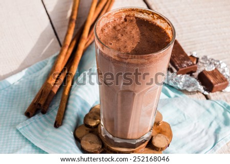 chocolate milk smoothie with banana, peanut butter and cinnamon, breakfast Royalty-Free Stock Photo #252168046
