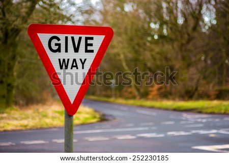 Give Way Uk Road sign with blurred background