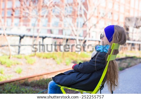 Adorable little girl enjoy sunny day on New York's High Line