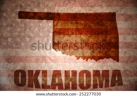 oklahoma map on a vintage american flag background