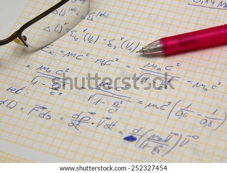 Physics and math exam, study set (hand writing notes, glasses, pencil and calculator