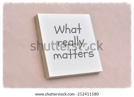 Text what really matters on the short note texture background