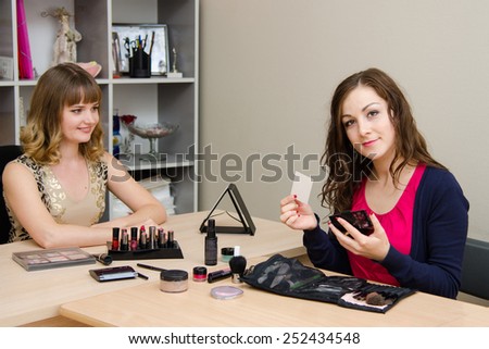 Makeup artist leaves his card customer