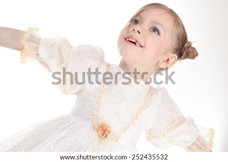 Beauty Ballerina young girl over white background