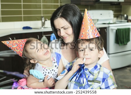A Birthday Family with mother and children