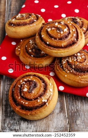 Swedish cinnamon buns on red dotted fabric