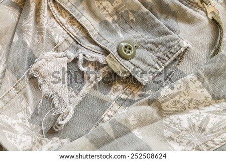 Close up old camouflage fabric texture background