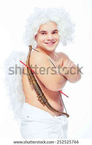 Bringing the love this Valentines. Portrait of an adorable little cupid holding a bow on his shoulder and posing with his hands crossed while standing isolated on white with copy space