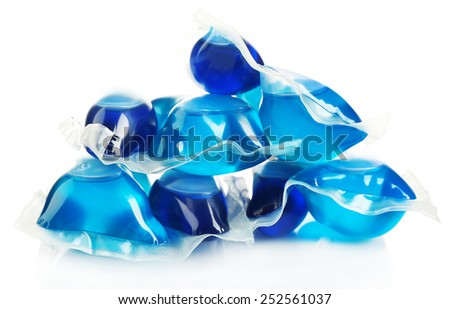 Gel capsules with laundry detergent isolated on white