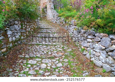 Byzantine road paved with stone inside fortified city of Mystras, Greece