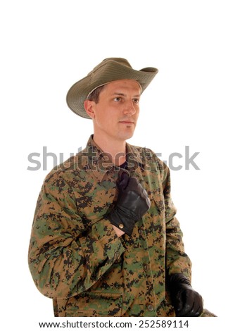 A portrait picture of a young soldier in camouflage uniform with a hat and black gloves, isolated for white background. 