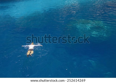 Snorkeler in turquoise water, Majorca, Balearic islands, Spain.