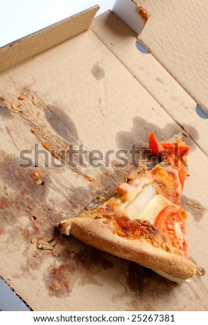 slice of pizza in a takeaway box