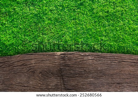 wooden with green grass background