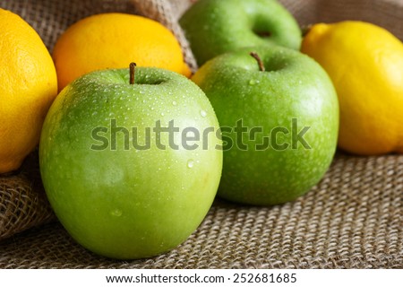 Stock image of apples and lemons freshly picked
