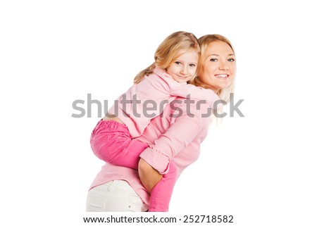 Picture of hugging smiling mother and daughter