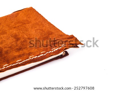 Handmade Vintage Book Diary, Brown Tan Suede / Close up, Handcrafted Leather Rustic Hand Sewing and Stitching. Isolated on White Background.