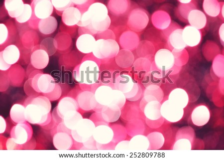 Bright and abstract blurred purple background with shimmering glitter