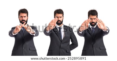 Business men making stop sign over white background