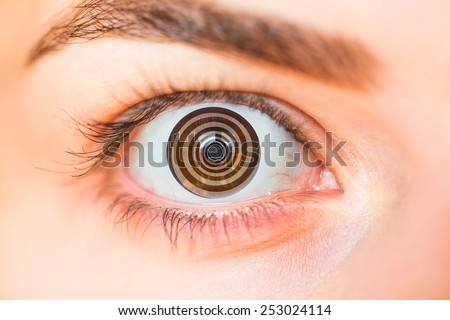 Hypnosis Spiral in eye Royalty-Free Stock Photo #253024114