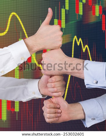 Hands showing thumb up  and stock graph on virtual screen