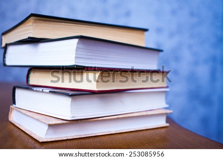 stack of book on the wooden table