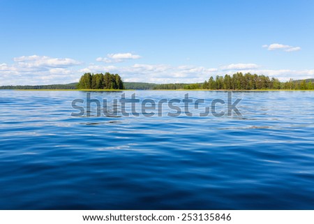 Finland lake scape at summer Royalty-Free Stock Photo #253135846