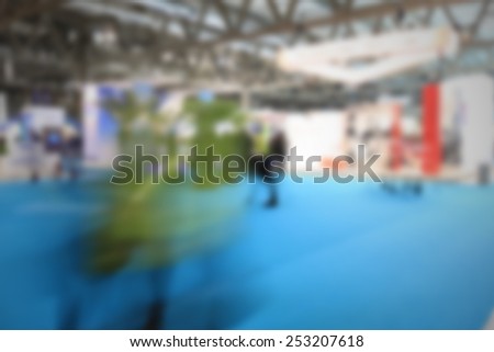 People at fair, background. Intentionally blurred, editing post production.