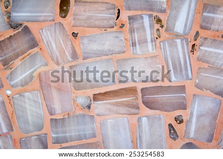 Colorful ceramic pattern with glass on the wall