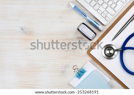 Wooden doctor desk with copy space Royalty-Free Stock Photo #253268191