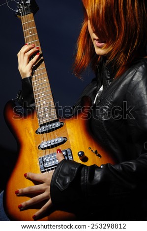 Guitarist girl silhouette
