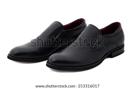 Black patent leather men shoes against white background. Male fashion with shoes on white.  The black man's shoes isolated on white background.