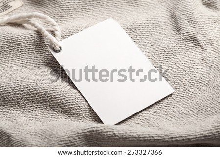 Cloth label tag blank white mockup Royalty-Free Stock Photo #253327366