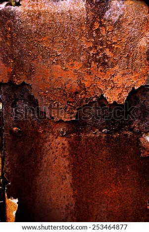 rusty old metal with old paint aged and cracked from time to time
