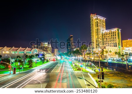 Long exposure of traffic on Harbor Drive and skyscrapers at night, in San Diego, California.