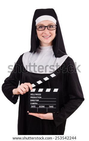 Young nun with clapperboard isolated on white