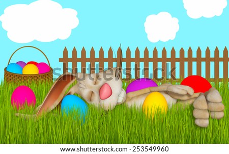 easter greeting card, Easter bunny sleeping in grass between Eas