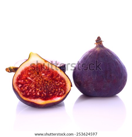 Fresh figs whole and cut isolated on white background