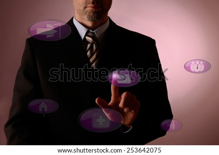 Business man pointing on an email icon