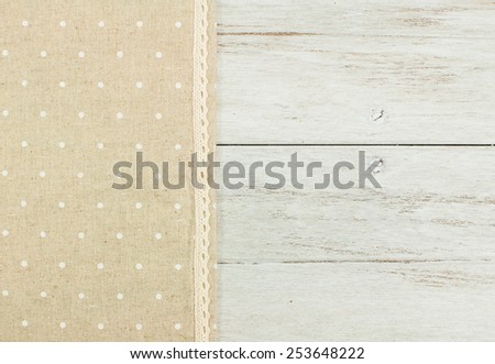 brown tablecloth on white wooden table.