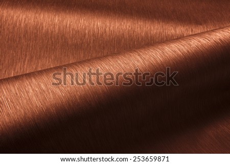 Abstract image of orange paper rolls